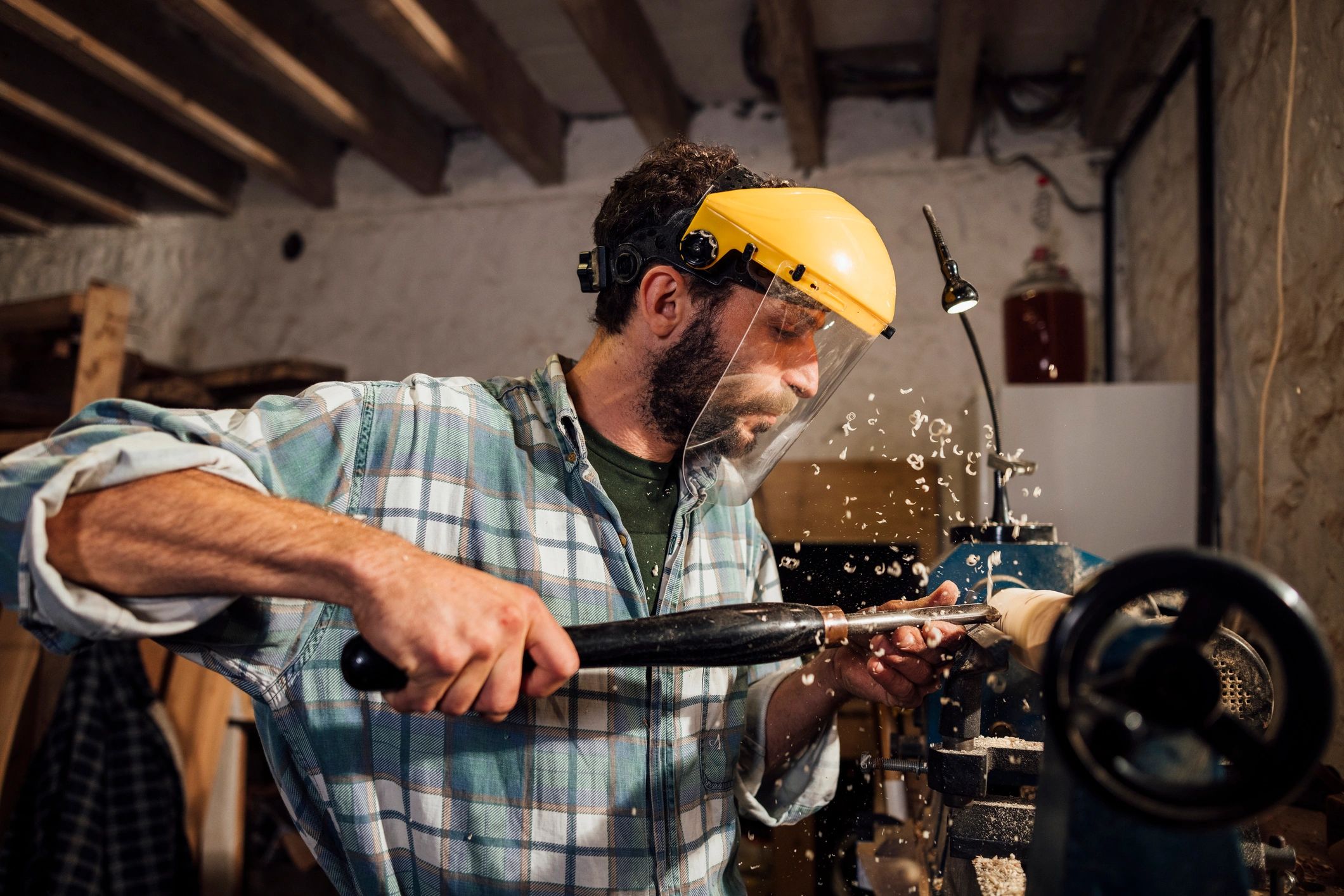 Craftsperson working carefully in a workshop